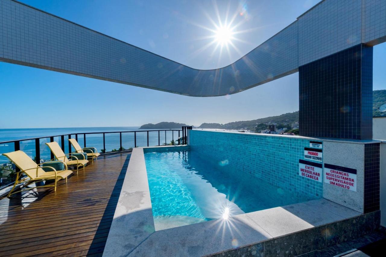 Confortavel Loft Em Condominio Com Piscina บอมบินญัส ภายนอก รูปภาพ
